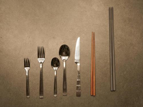 a group of utensils sitting on top of a table at Blue Ocean Awaji in Sumoto