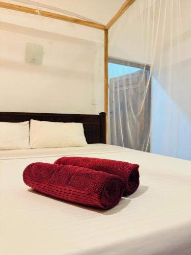 Postel nebo postele na pokoji v ubytování Uluwatu Surf Hostel