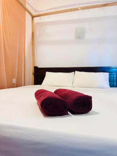 Postel nebo postele na pokoji v ubytování Uluwatu Surf Hostel