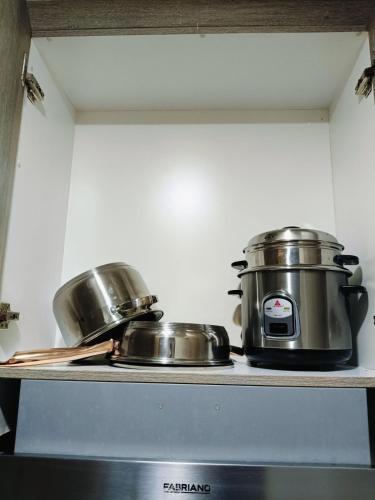 Una cocina o zona de cocina en Coast Residences