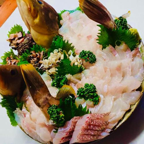 a plate of food with rice and broccoli on it at 松川屋旅館 in Matsuura