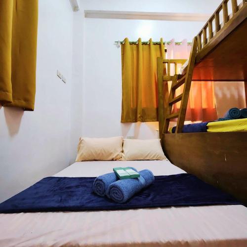 Postel nebo postele na pokoji v ubytování Pertible Beach Resort