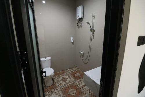 Ένα μπάνιο στο HOMY guesthouse cirebon