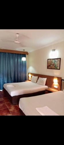 Postel nebo postele na pokoji v ubytování SB BEACH WAY Calangute