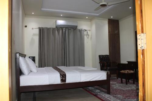 Postel nebo postele na pokoji v ubytování Hotel Le Meridien