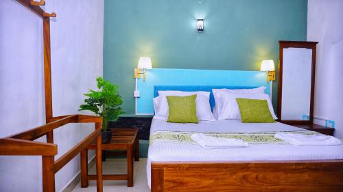Katil atau katil-katil dalam bilik di Hotel Planet Residency