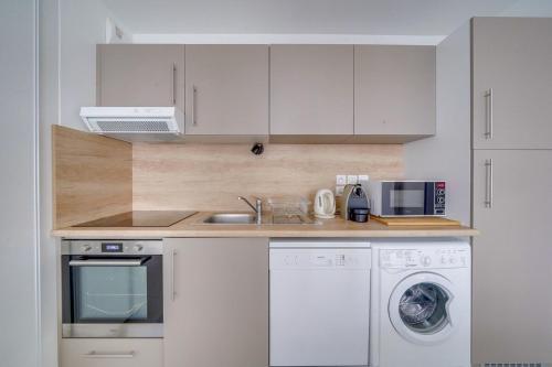 Η κουζίνα ή μικρή κουζίνα στο Appartement Dune-Arcachon centre
