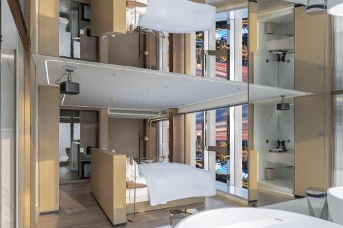 a room with a view of a building at 重庆Indition英迪逊高空酒店 解放碑来福士店 in Chongqing