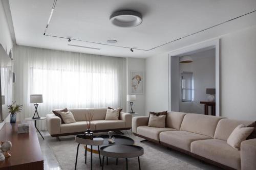 Zona d'estar a Sleak condo