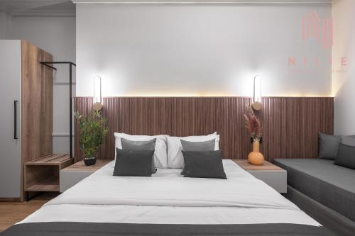 Katil atau katil-katil dalam bilik di Esther Suites, Nilie Hospitality MGMT