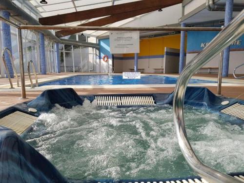 a hot tub with water in a swimming pool at AL ANDALUS-THALASSA Premium in Vera