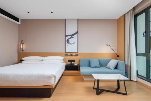 Postel nebo postele na pokoji v ubytování Fairfield by Marriott Chengdu Hi-Tech Zone