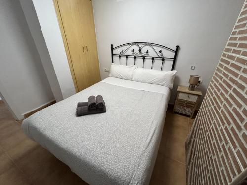 Posteľ alebo postele v izbe v ubytovaní Apartamento frente al Mar Pedregalejo