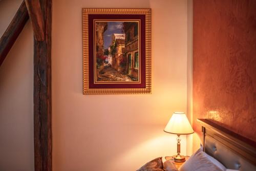 Postel nebo postele na pokoji v ubytování Hotel Dvorac Jurjevec