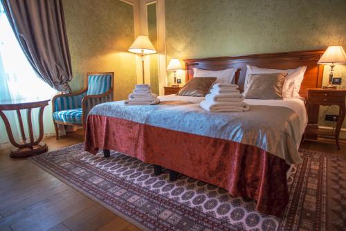 Postel nebo postele na pokoji v ubytování Hotel Dvorac Jurjevec