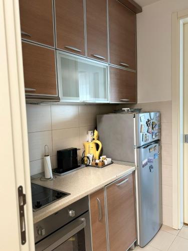 Cuisine ou kitchenette dans l'établissement MANHATTAN APARTMAN Belvil