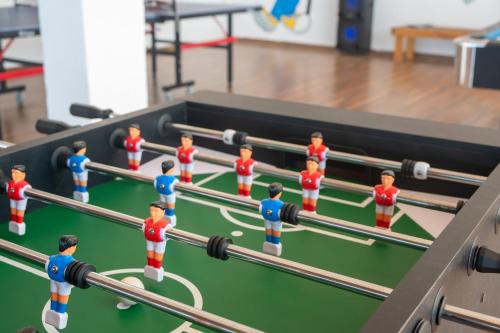 a group of lego men playing a game of snooker at Royal Mandarin Hotel & Resort in Pwani Mchangani