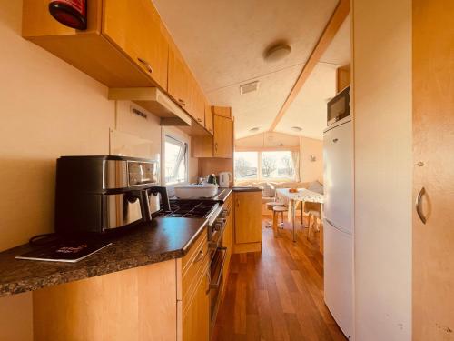 Kuchyň nebo kuchyňský kout v ubytování Newton Stewart-Sleeps 6-Pool-Parking-Pet Friendly