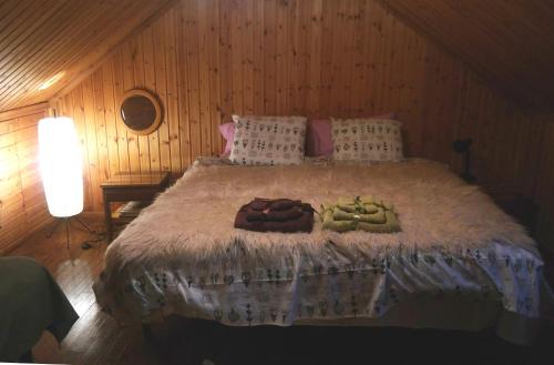 Ένα ή περισσότερα κρεβάτια σε δωμάτιο στο The Lake's House