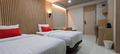 Postel nebo postele na pokoji v ubytování Baan Bangkok 97 Hotel