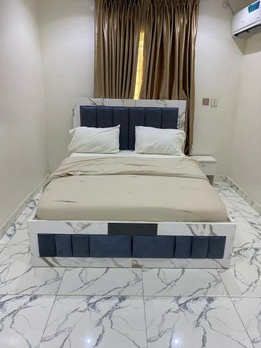 Postel nebo postele na pokoji v ubytování 3 bedroom duplex in Ikorodu