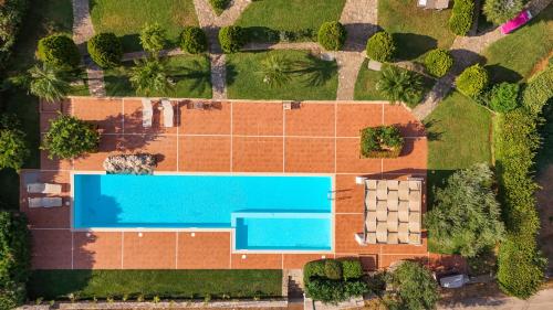 Πισίνα στο ή κοντά στο Cisterna Apartment - Shared Pool