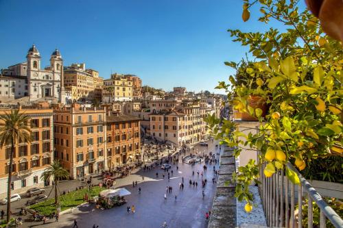 a view of a street in a city with buildings at The Inn at the Spanish Steps Luxury Collection - The Inn at the Spanish Steps in Rome