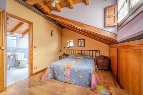 Postel nebo postele na pokoji v ubytování Alojamientos Casa Luisa