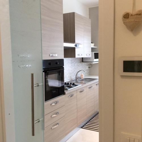 Η κουζίνα ή μικρή κουζίνα στο Bed & Breakfast Sforza 19