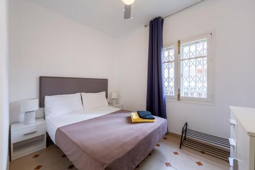 Ένα ή περισσότερα κρεβάτια σε δωμάτιο στο Bilbao 22 apartamento comodo