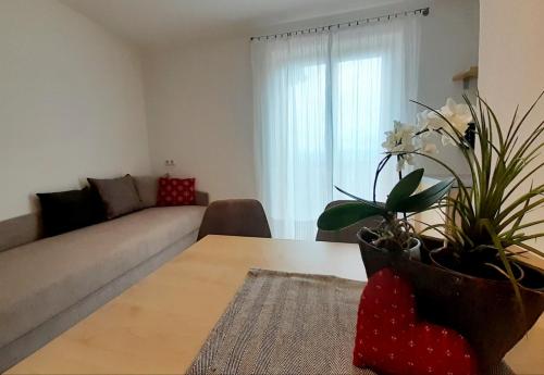 Un lugar para sentarse en Fröhlichhof Wohnung Apfelblüte