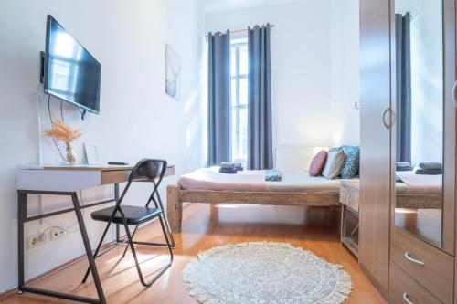Posteľ alebo postele v izbe v ubytovaní Cedar Inn Budapest - Palace District