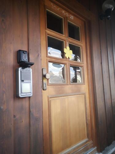 a door with a phone and a star on it at Antonia in Egling