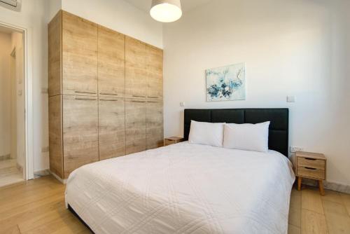 Ένα ή περισσότερα κρεβάτια σε δωμάτιο στο Pafia City 2 - 402 1 BED