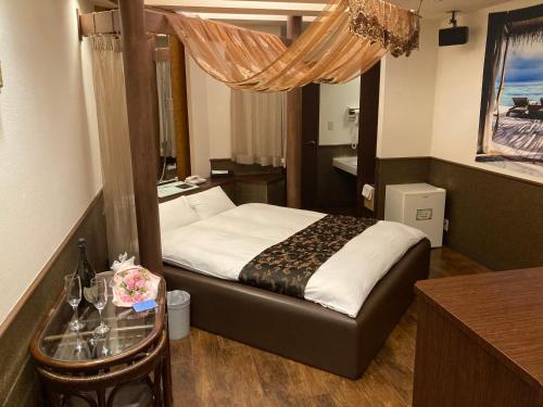 Postel nebo postele na pokoji v ubytování Hotel MGM