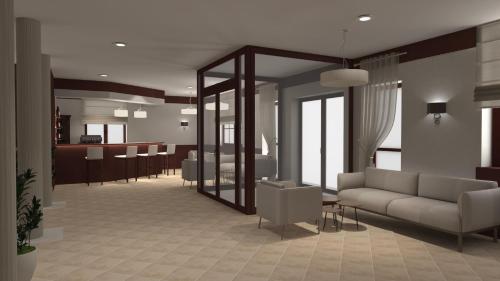 a living room with a couch and a table at Hotel Basztowy in Sandomierz