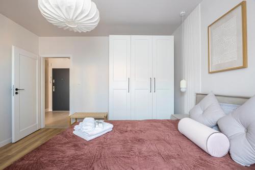 Łóżko lub łóżka w pokoju w obiekcie Comfy Aparts Św Mikołaja