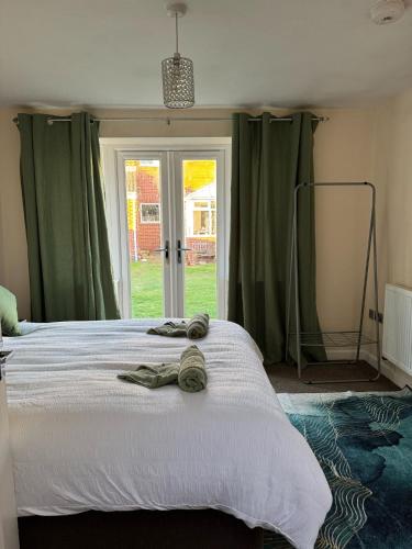 Postel nebo postele na pokoji v ubytování The Comfort Retreat Bungalow