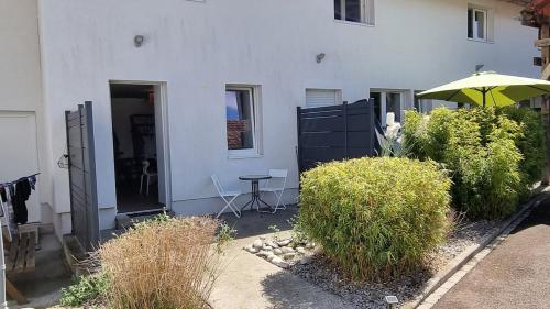 L'évasion, terrasse parking