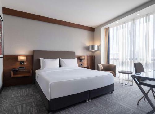 A bed or beds in a room at Radisson Blu Hotel Ankara Cankaya