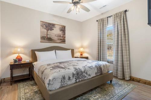 a bedroom with a bed and a window at Cloverleaf Cottage in Hollister
