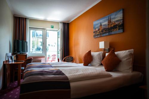 Una cama o camas en una habitación de Hotel Boulevard