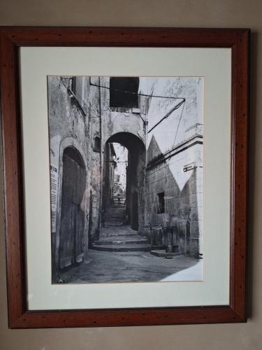 a drawing of an alley in an old building at Morry's Lodge Guest House in Sora
