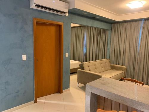 Ruang duduk di Condominio Barretos Thermas Park - Condohotel