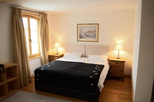 Ένα ή περισσότερα κρεβάτια σε δωμάτιο στο Stylish Traditional Chalet