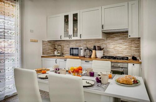 Η κουζίνα ή μικρή κουζίνα στο 10 min dal Mare - New York Style - Apartment