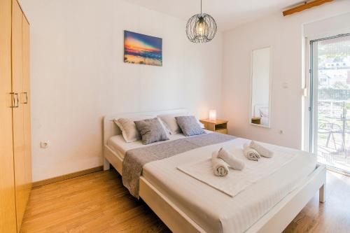 Ένα ή περισσότερα κρεβάτια σε δωμάτιο στο Dream House Rajic