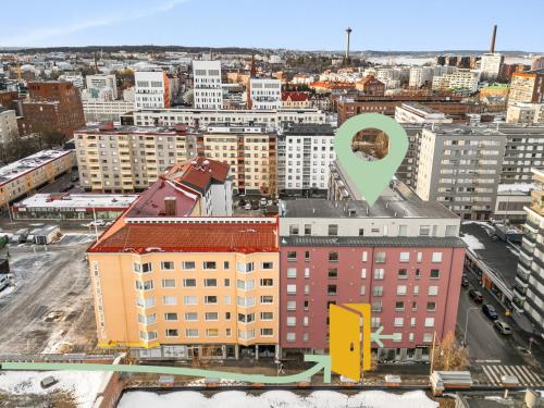an aerial view of a city with buildings at Come in! "Ilmatar" Luxury apartments in the heart of Tampere with yacuzzi option! in Tampere