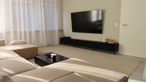 TV a/nebo společenská místnost v ubytování Zentral & Modern Nähe Düsseldorf und Köln