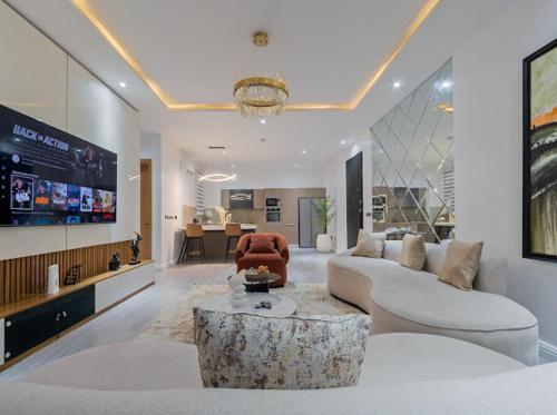 Zuma 2Bed tesisinde bir odada yatak veya yataklar